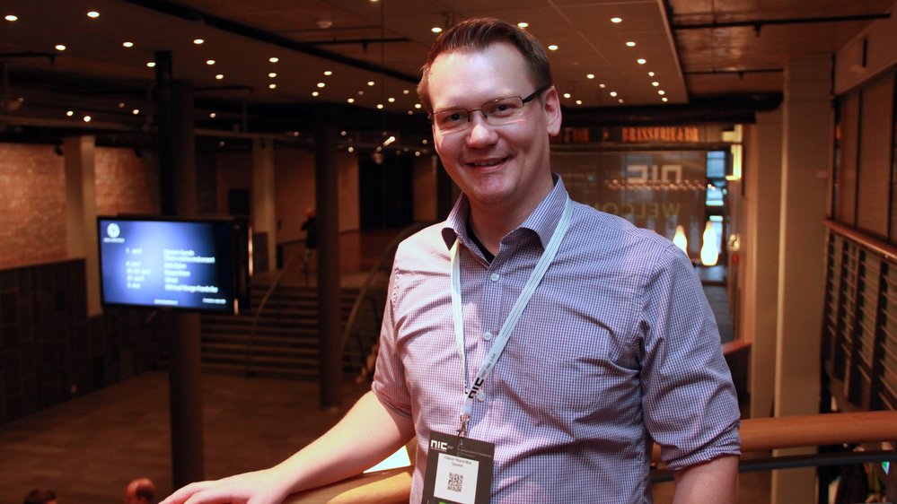 man attending conference
