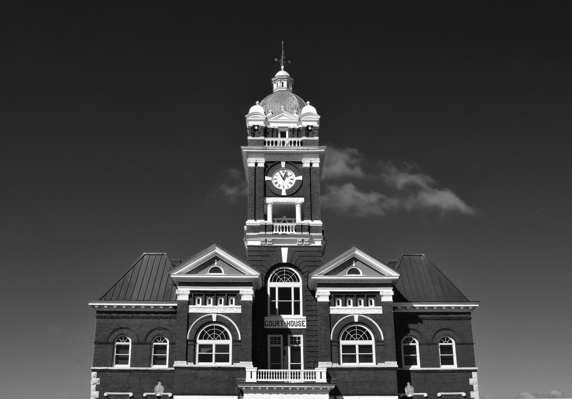 black and white photo of court house front facade